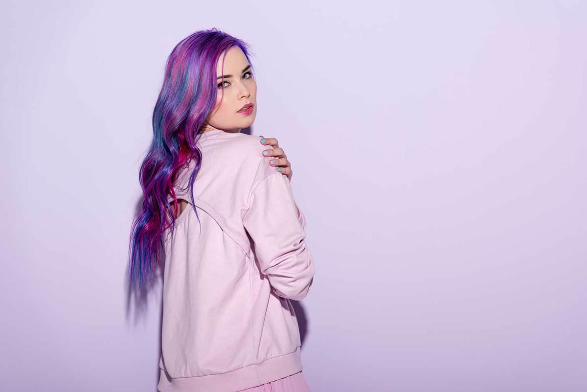 Sensual young woman with colorful hair