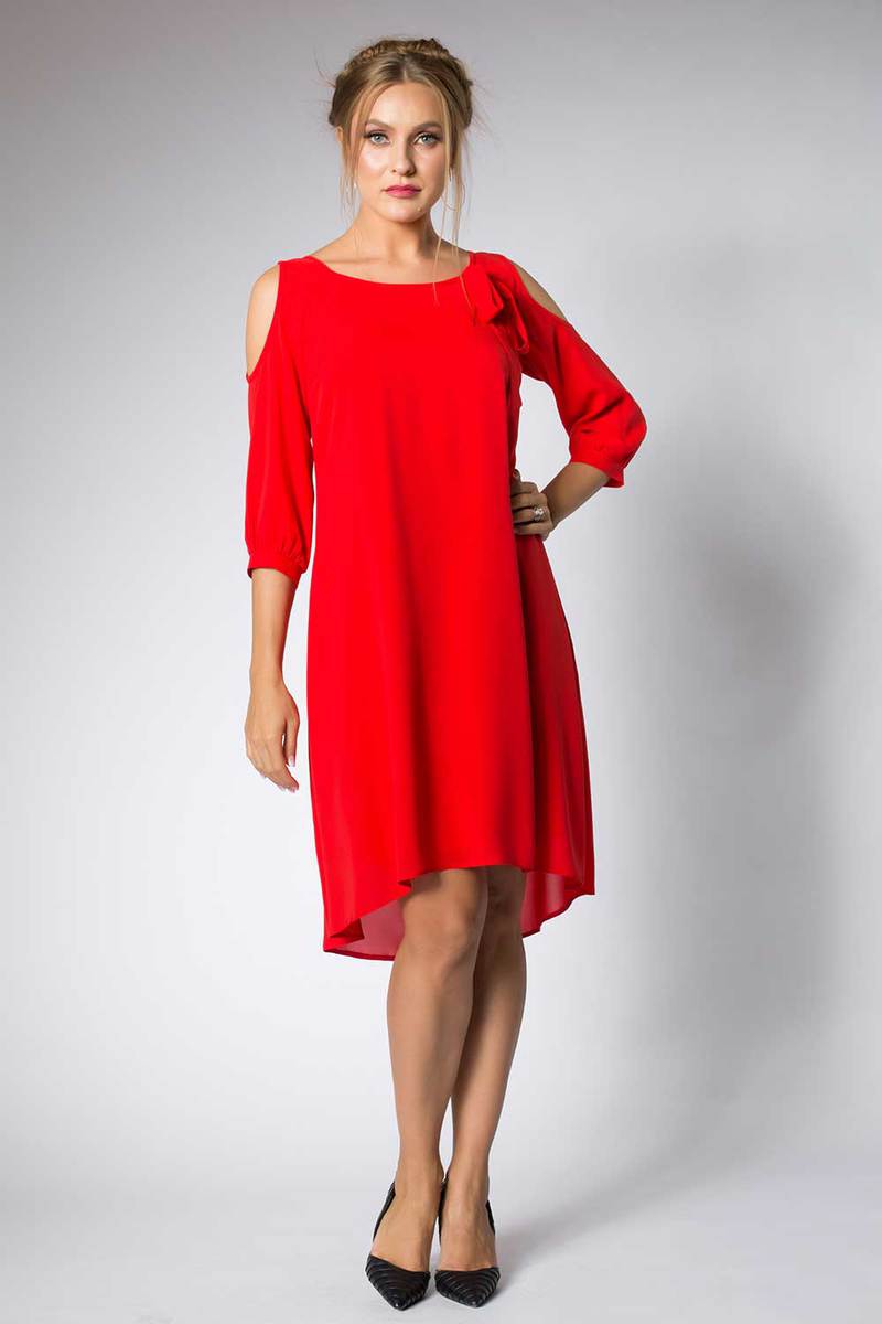 Beautiful model posing in fashion red dress