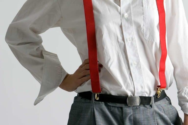 A woman wearing white long sleeve paired with belt and suspender, Should You Wear a Belt With Suspenders?
