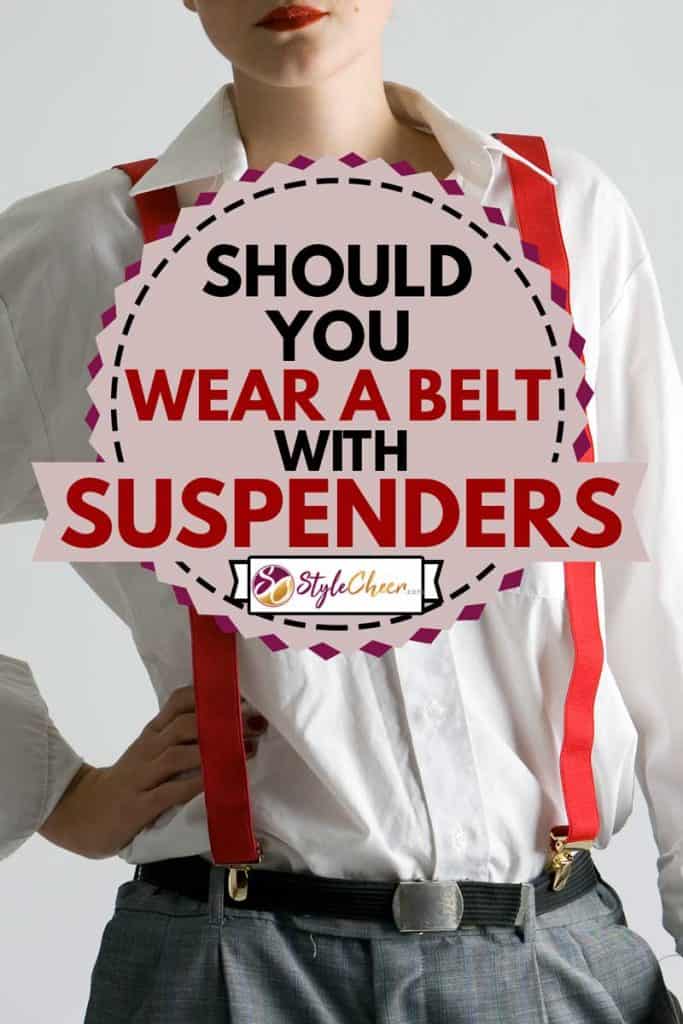 Eine Frau trägt ein weißes Langarmshirt gepaart mit Gürtel und Hosenträgern, sollten Sie einen Gürtel mit Hosenträgern tragen?