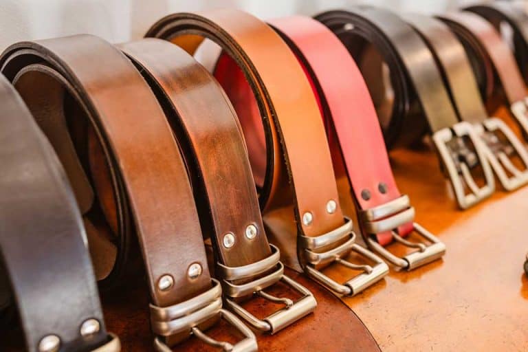 Handmade leather belts for sale in a stand of the crafts market, How Much Does a Leather Belt Cost?
