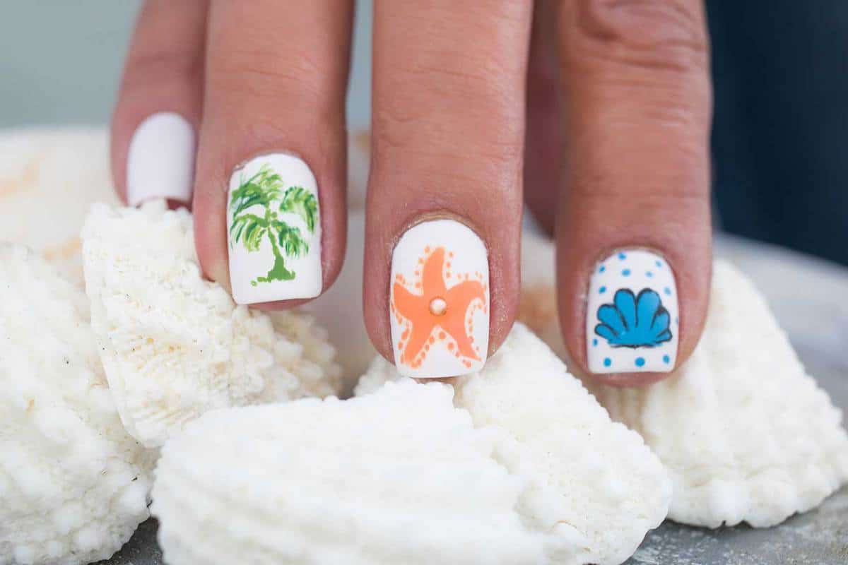 Starfish and palm tree nail art design