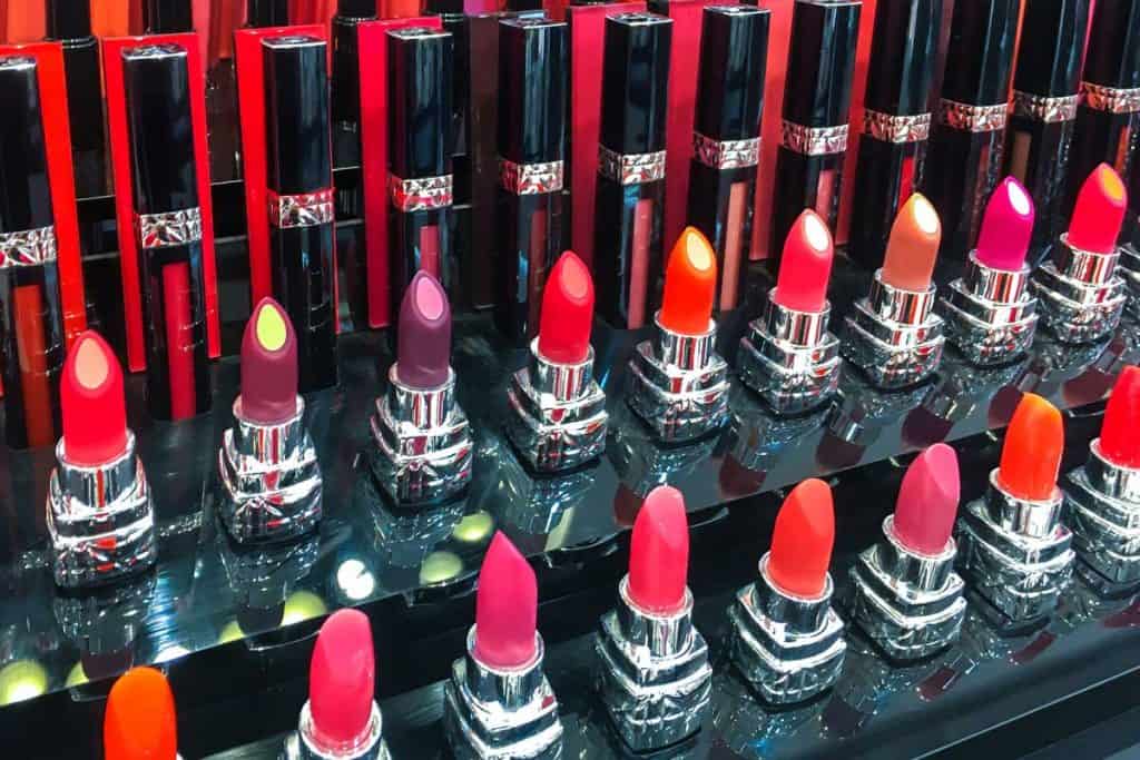 Colorful lipsticks on cosmetic shop, Does Lipstick Expire If Unopened? Here's What You Need to Know