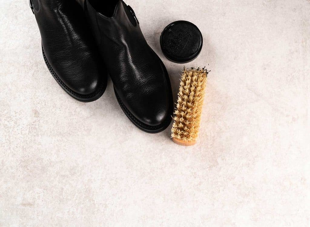 Leather boots and shoe polish cream