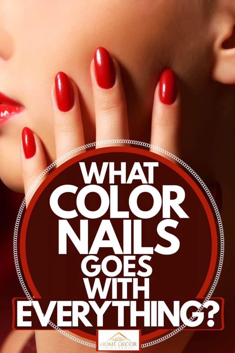 A woman showing her red nails, What Color Nails Goes With Everything?