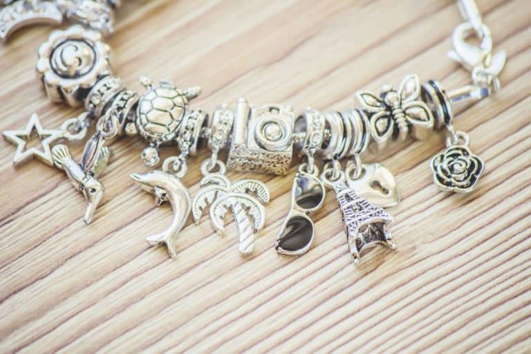 A gorgeous silver pandora bracelet with decorative shapes on it, Can You Shower With A Pandora Bracelet?