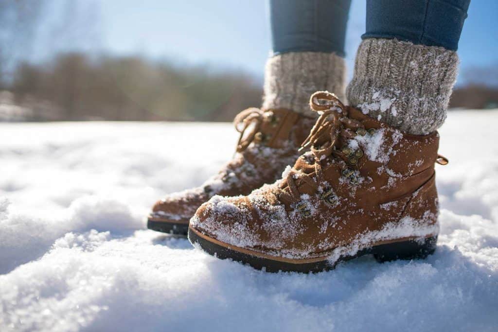 A pair of mountaineer's boots in the snow