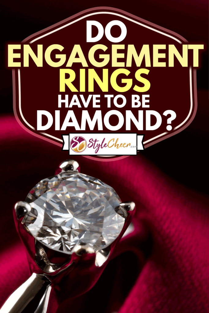 Macro shot of an engagement solitaire diamond ring. Burgundy silk background, Do Engagement Rings Have To Be Diamond?