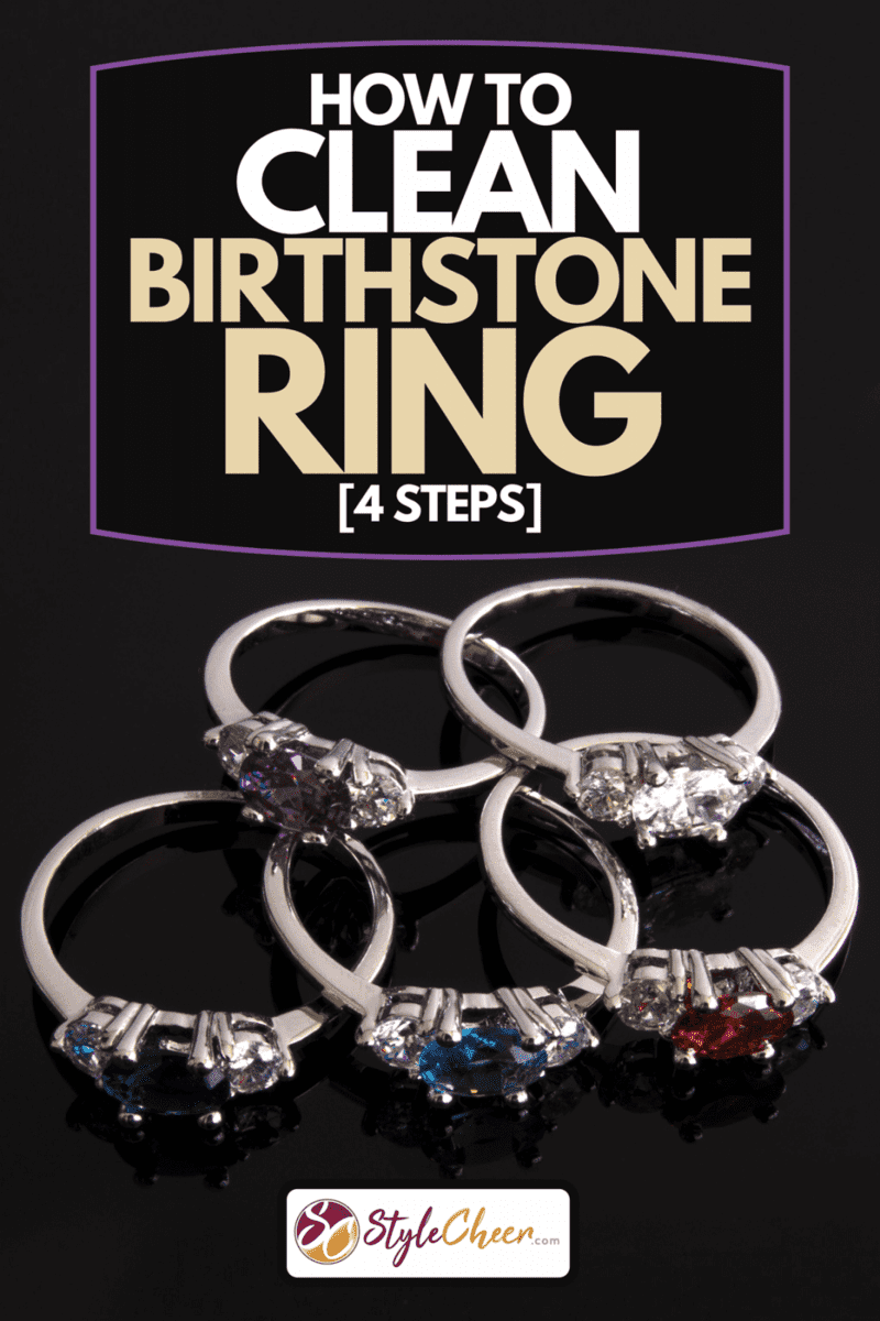 Five birthstone rings with aquamarine, amethyst, sapphire, diamond and ruby stones on black background, How To Clean Birthstone Ring [4 Steps]