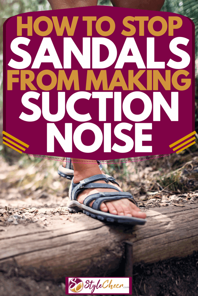 A woman wearing sandals while hiking down a steep hill, How To Stop Sandals From Making Suction Noise