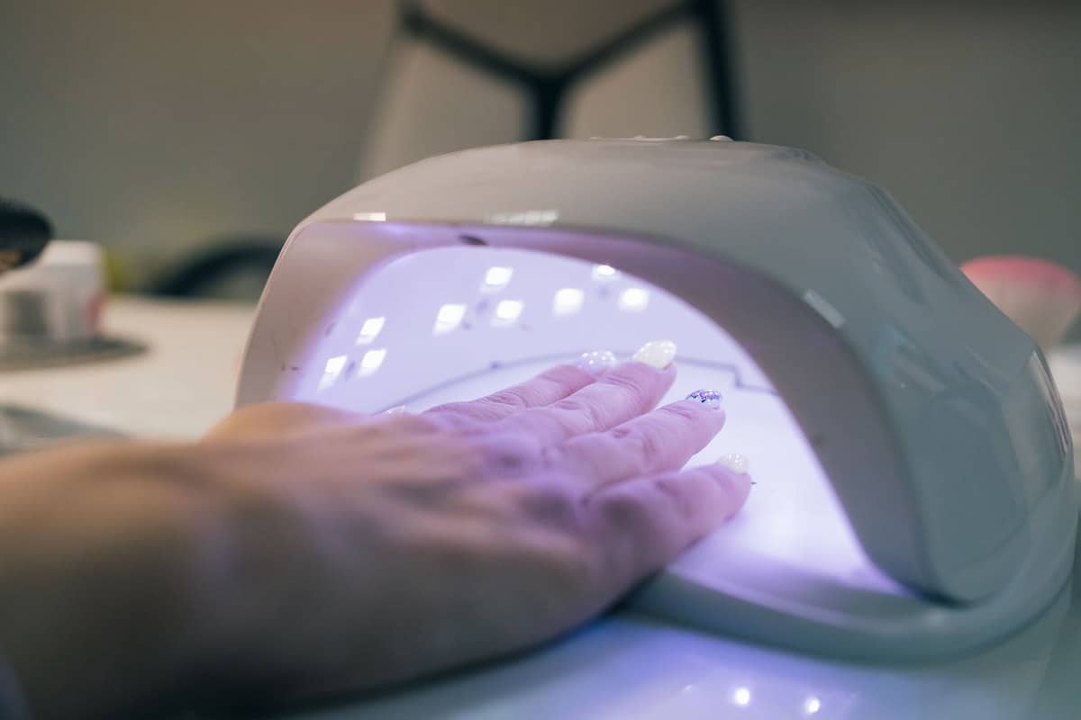 UV lamp gel polish process inside an expensive salon