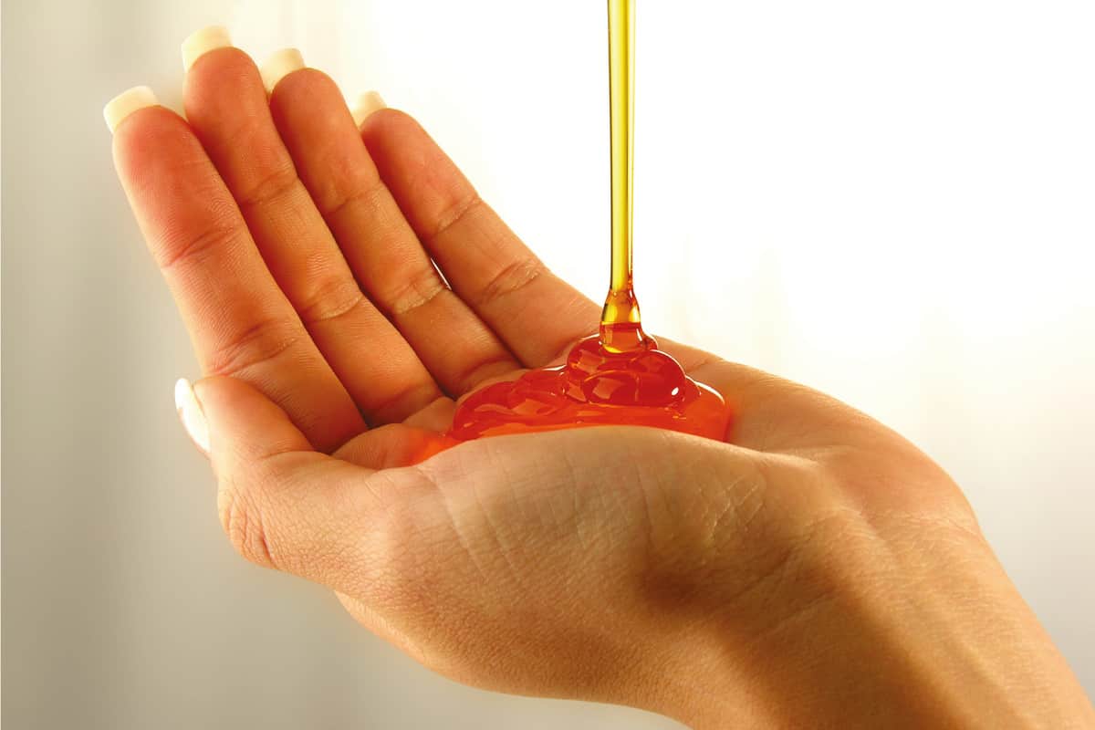 Woman hand with liquid soap