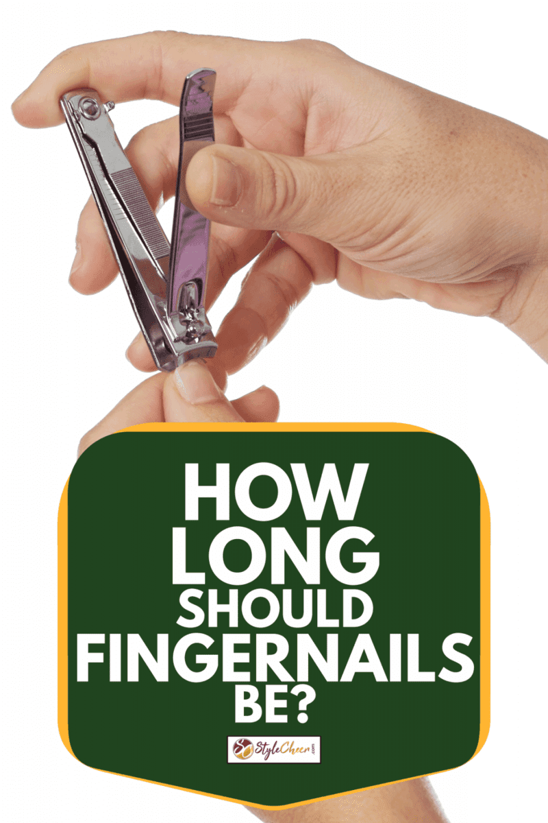 young teen hands holding a nail clipper about to trim fingernails, How Long Should Fingernails Be