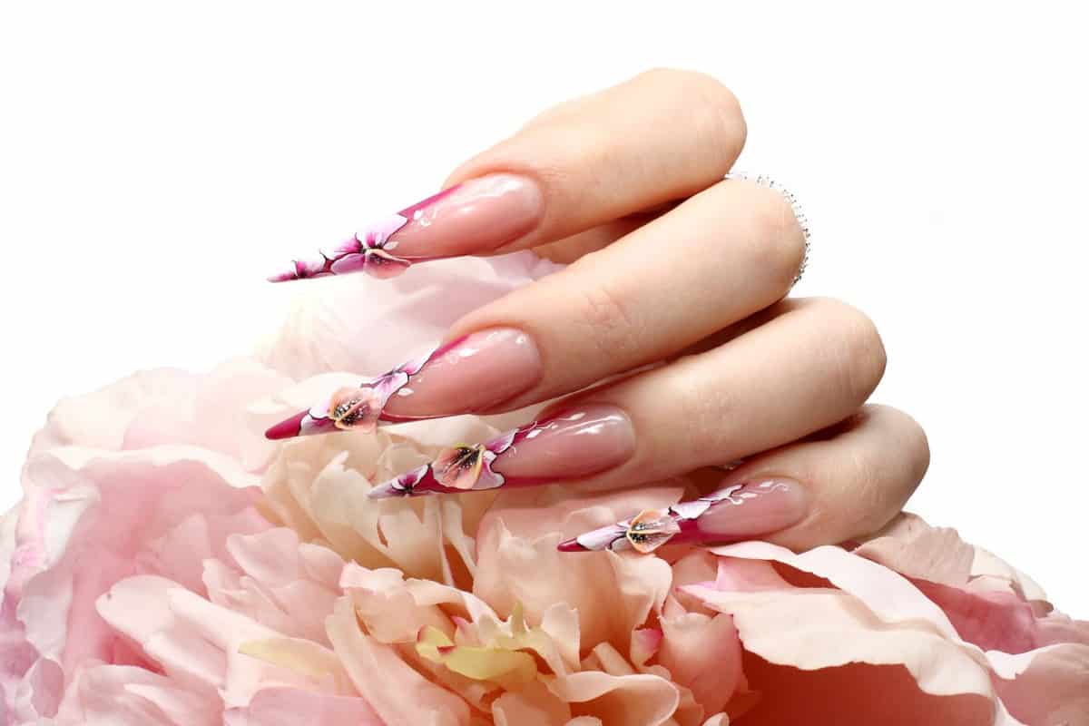Acrylic manicure of a woman with floral design