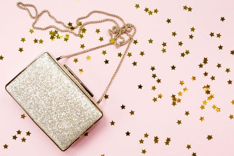 Festive evening golden clutch with star sprinkles on pink, 18 Types Of Purses And Handbags [The Ultimate Guide]