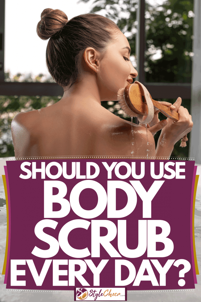 A woman on a bathtub using a scrub on her back, Should You Use Body Scrub Every Day?