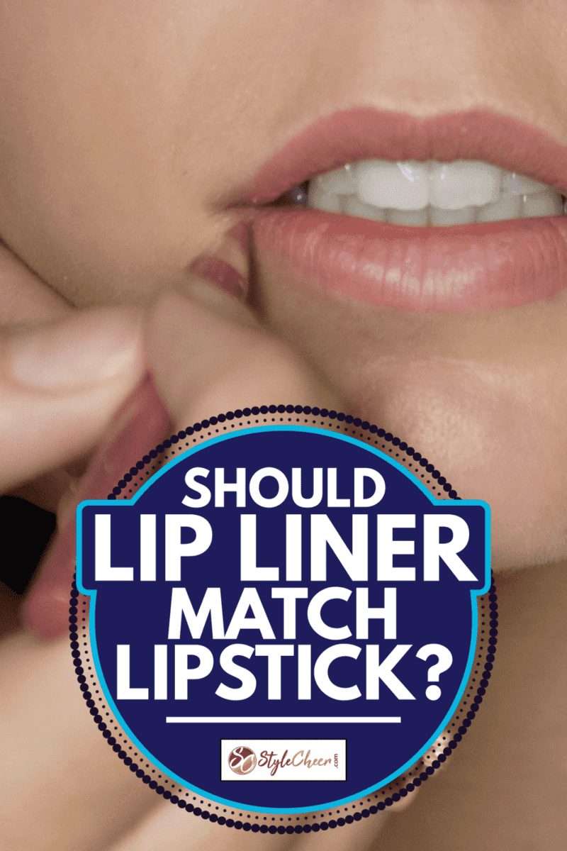 female supermodel getting a makeup of lipliner by a makeup artist. Should Lip Liner Match Lipstick