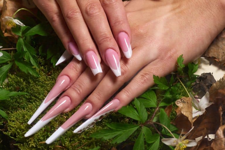horizontal shot of unrecognizable woman hands with glamour long artificial acrylic nails, Why Do My Acrylic Nails Keep Lifting?