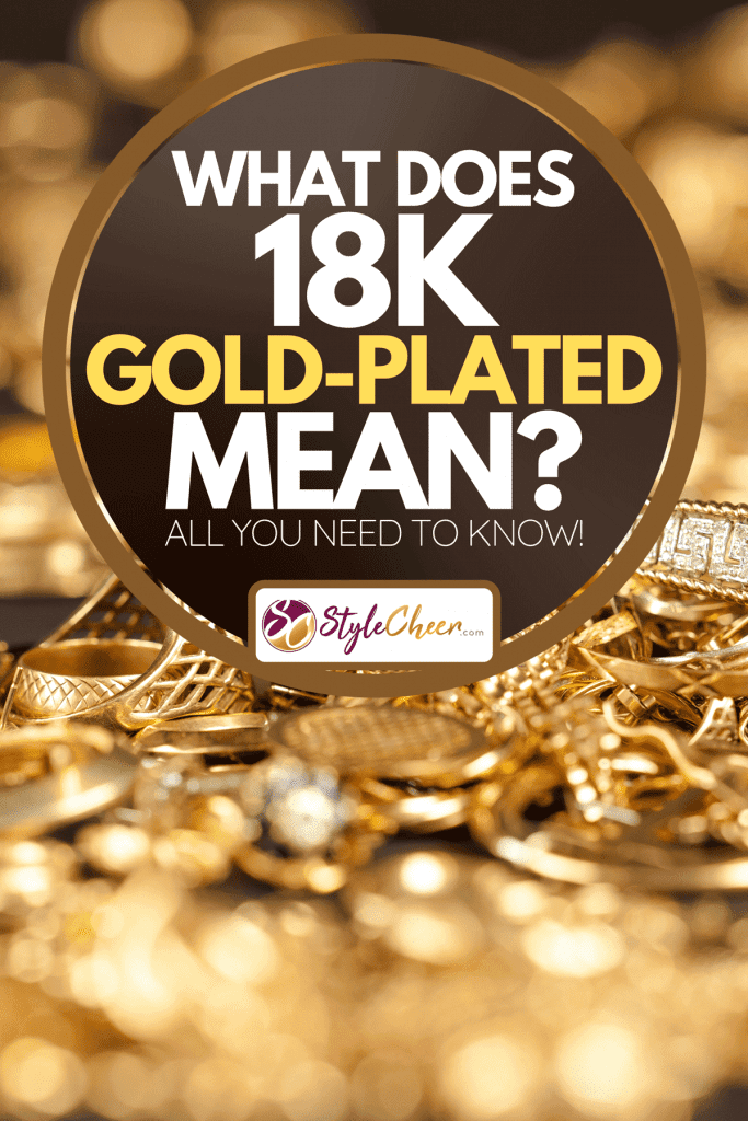 A table of scrap gold being inspected, What Does 18k Gold-Plated Mean? [All You Need To Know!]