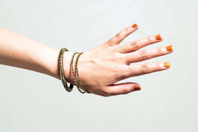Woman wearing a bangle bracelet, 5 Great Ways To Wear A Bangle Bracelet