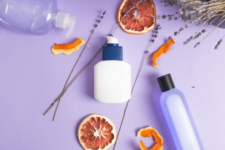 Cosmetic bottle beauty treatment with a dry lavender and orange dry, 11 Types Of Face Cleansers To Know