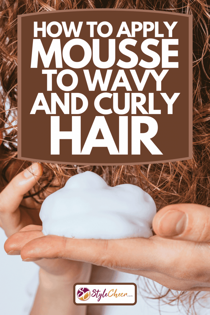 A woman's hands apply styling mousse to her curly hair, How To Apply Mousse To Wavy And Curly Hair