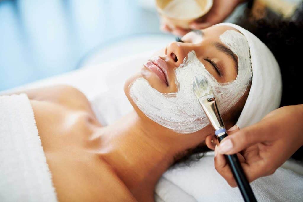 Shot of an attractive young woman getting a facial at a beauty spa