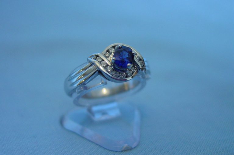 A beautiful ring with Sapphire and diamonds, How To Clean A Sapphire Ring [A Complete Guide]