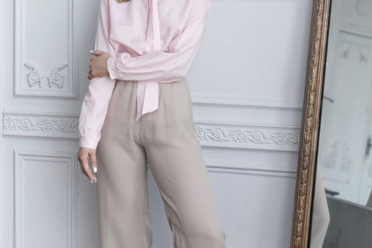 A beautiful woman wearing light pink top and an off white colored palazzo pant, Are Palazzo Pants Business Casual? Are They Appropriate For The Office?