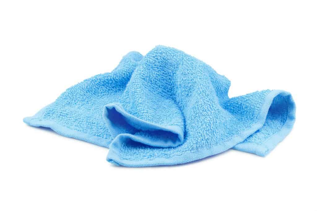 A small blue towel on a white background