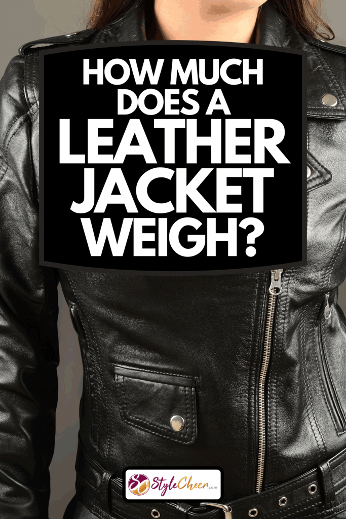 A fashionable young woman wearing bikers leather jacket isolated on gray background, How Much Does A Leather Jacket Weigh?