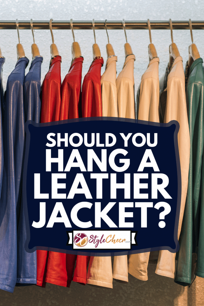 Colored leather jackets in a variety of different colors hanging up in a row on the rail,Should You Hang A Leather Jacket?