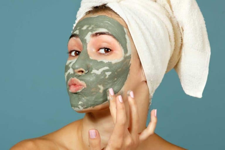 Teen girl applying facial clay mask, Should You Do A Clay Mask Before Or After A Shower?