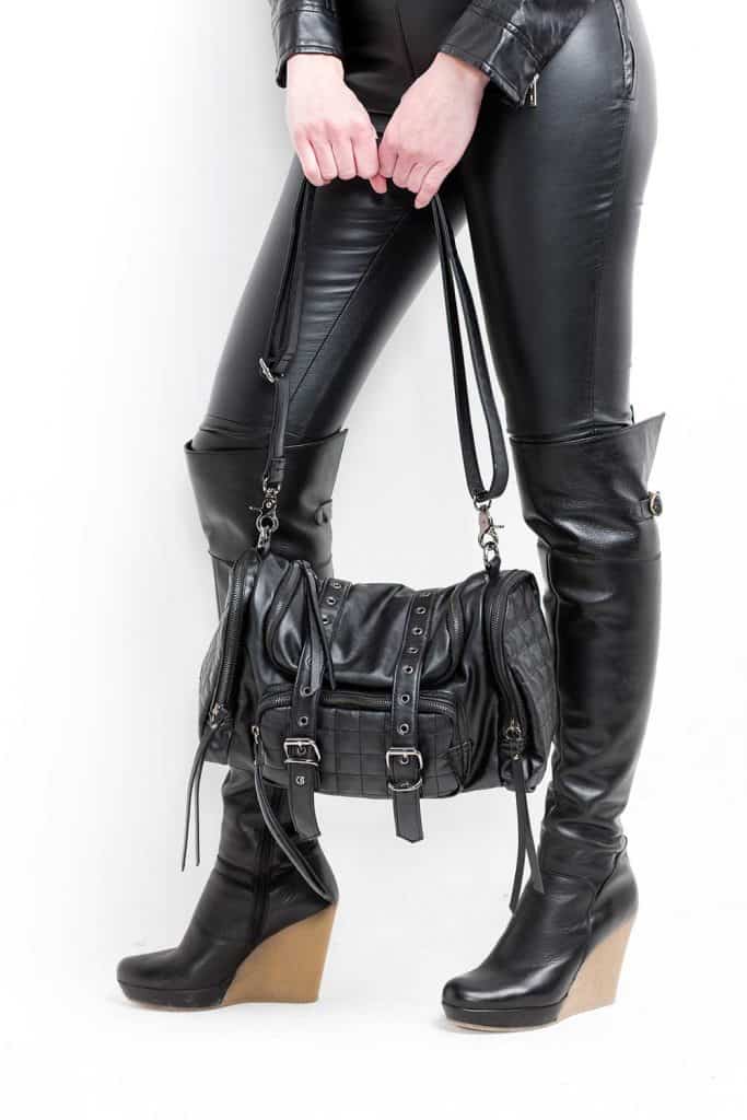 Woman with boots and handbag