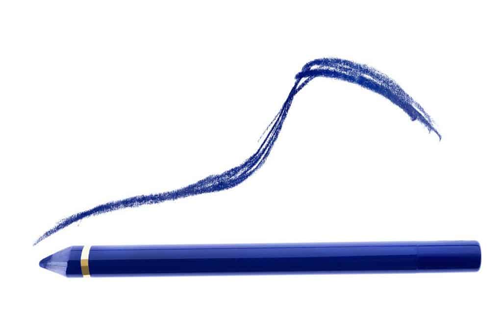 Blue kajal eyeliner pencil and color swatch on white background