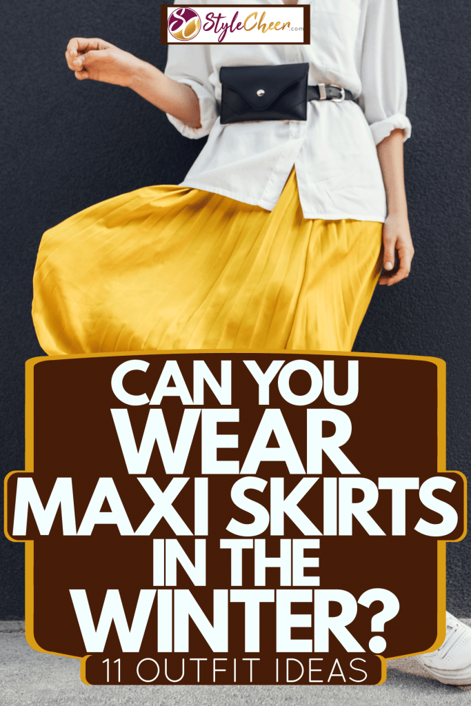 A woman wearing a white blouse and a yellow maxi skirt, Can You Wear Maxi Skirts In The Winter? [11 Outfit Ideas]