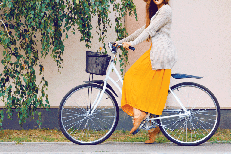 Hipster girl with retro bike outdoors, wearing maxi skirt and leather shoes. What Shoes To Wear With Maxi Skirt [Winter And Summer Options]