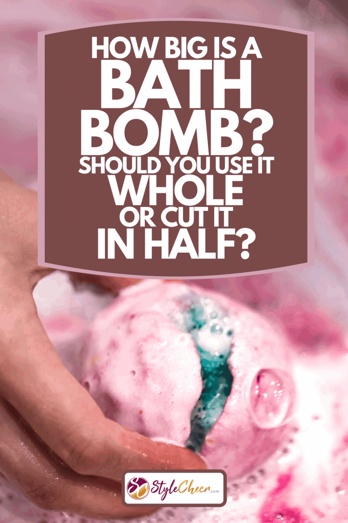 A bright natural fizzy bath bomb dissolves in the hand, How Big Is A Bath Bomb? Should You Use It Whole Or Cut It In Half?