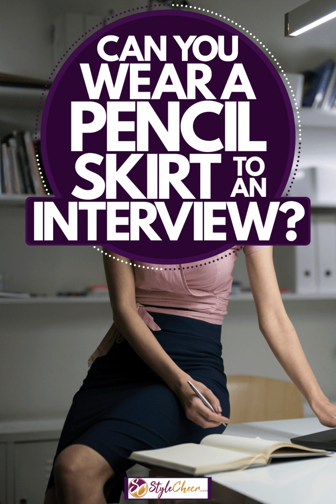 A beautiful business woman wearing a pink blouse and a black pencil dress, Can You Wear A Pencil Skirt To An Interview?