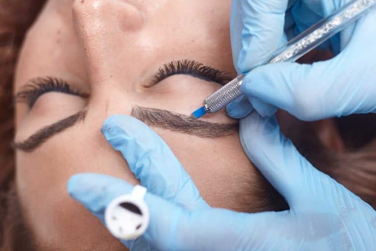 Close-up of hands microblading, adding pigment to eyebrows, Can Microblading Be Corrected?