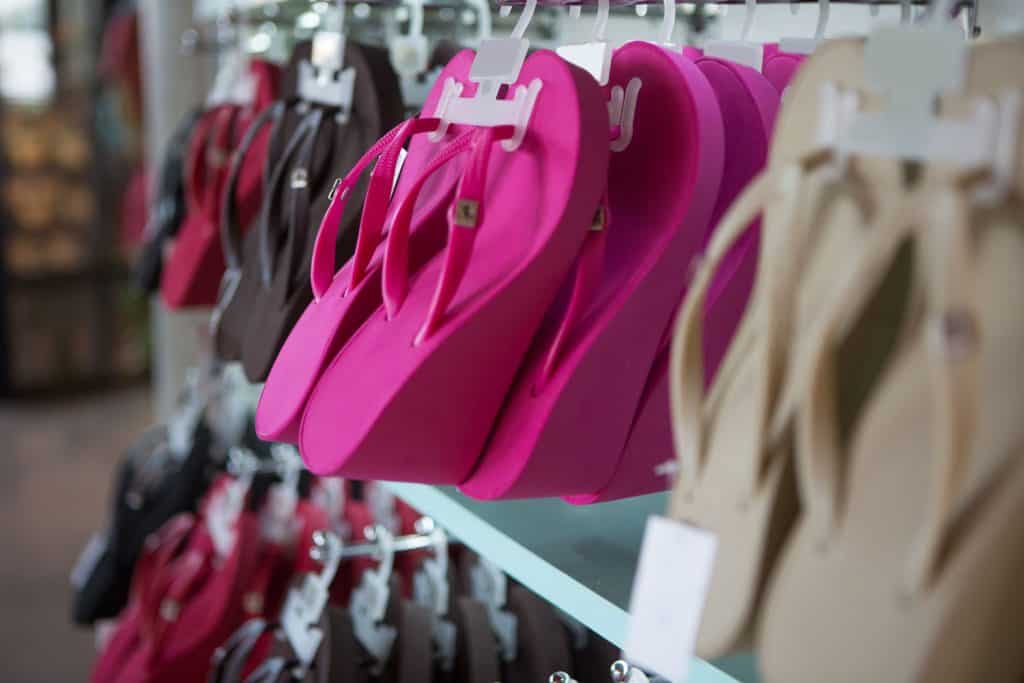 Flip flops hanged for display at a store