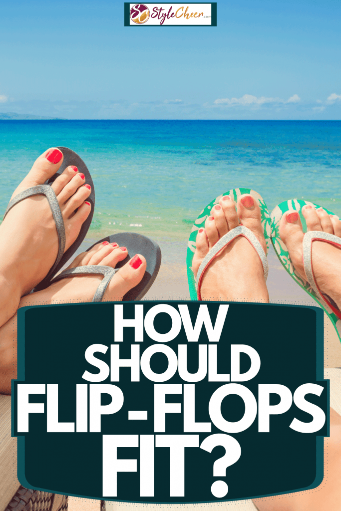 Two women wearing black and green flip flops and getting tan at the beach, How Should Flip-Flops Fit?