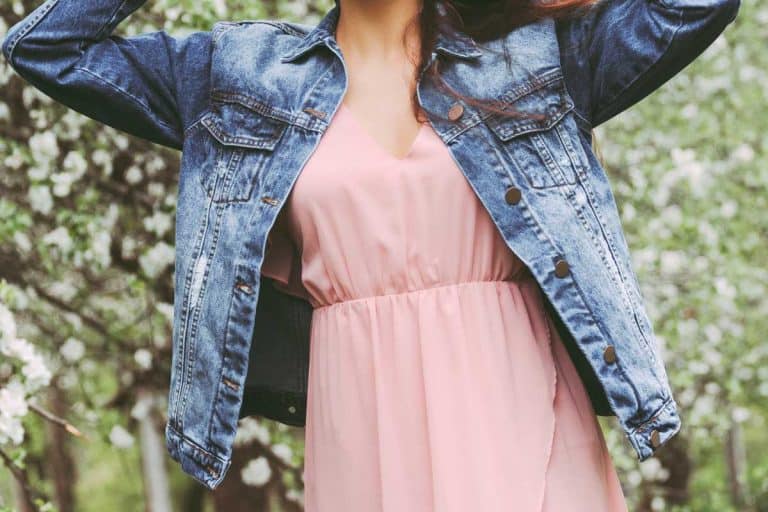 Young beautiful hippie girl in stylish pink dress and denim jacket, How To Wear A Denim Jacket With A Dress [15 Awesome Ideas]
