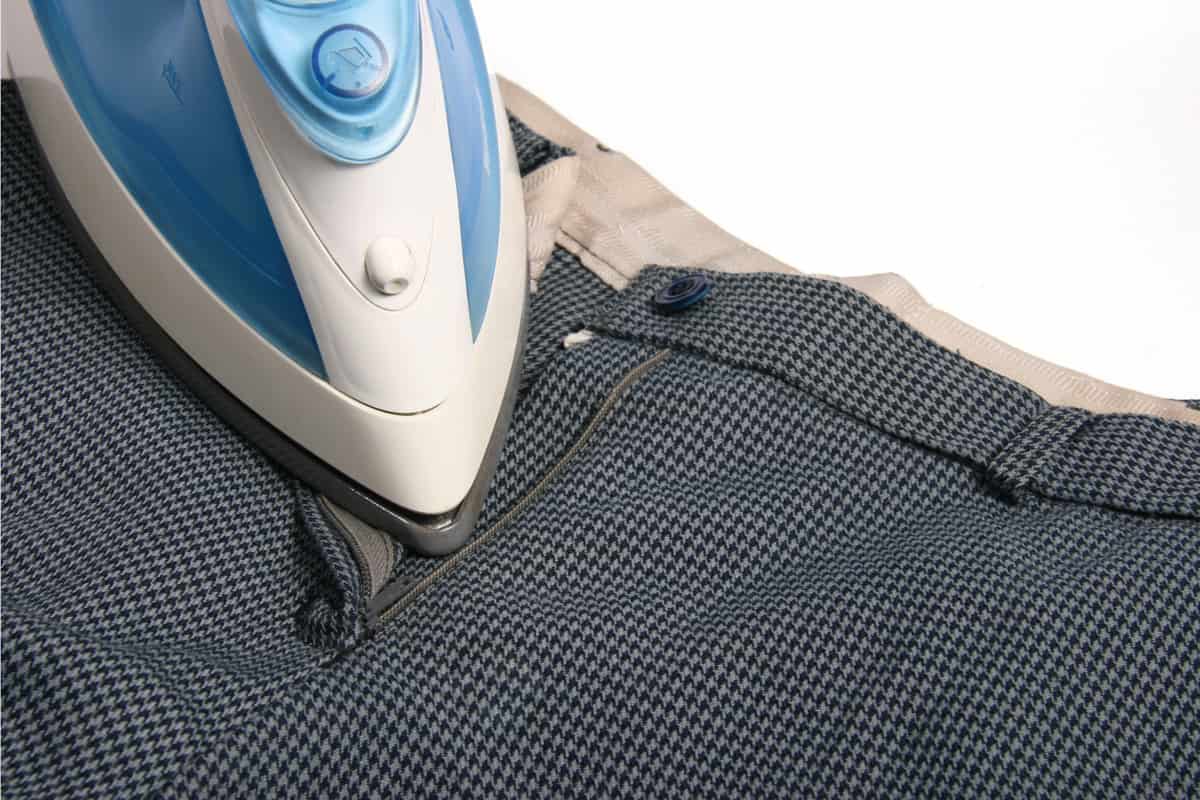 hot flat iron on trousers removing wrinkles