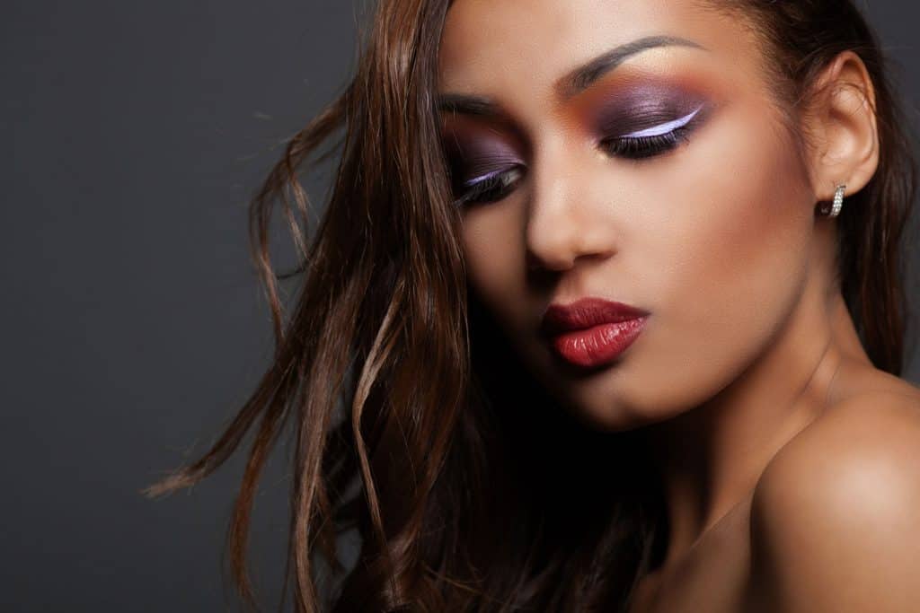 Fashion young African woman with plum blush and purple eyeshadow, What Color Blush Goes With Purple Eyeshadow?
