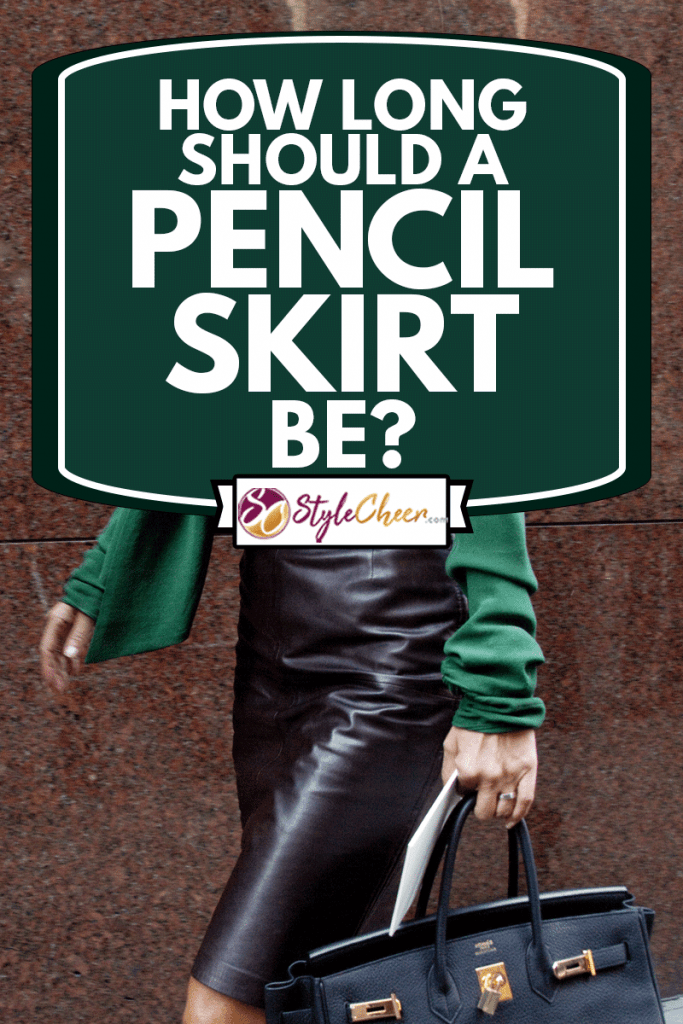 A woman dressed in pencil skirt and green casual blouse while walking in New York City, How Long Should A Pencil Skirt Be?