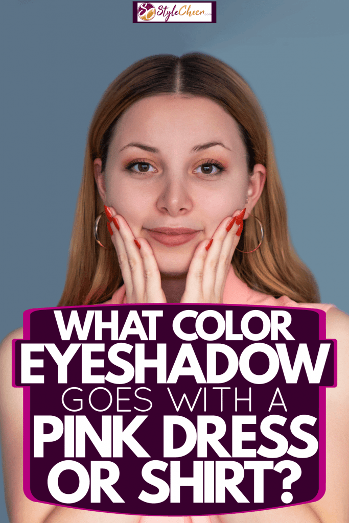 A woman wearing a pink sleeveless dress on a dark blue background, What Color Eyeshadow Goes With A Pink Dress Or Shirt?