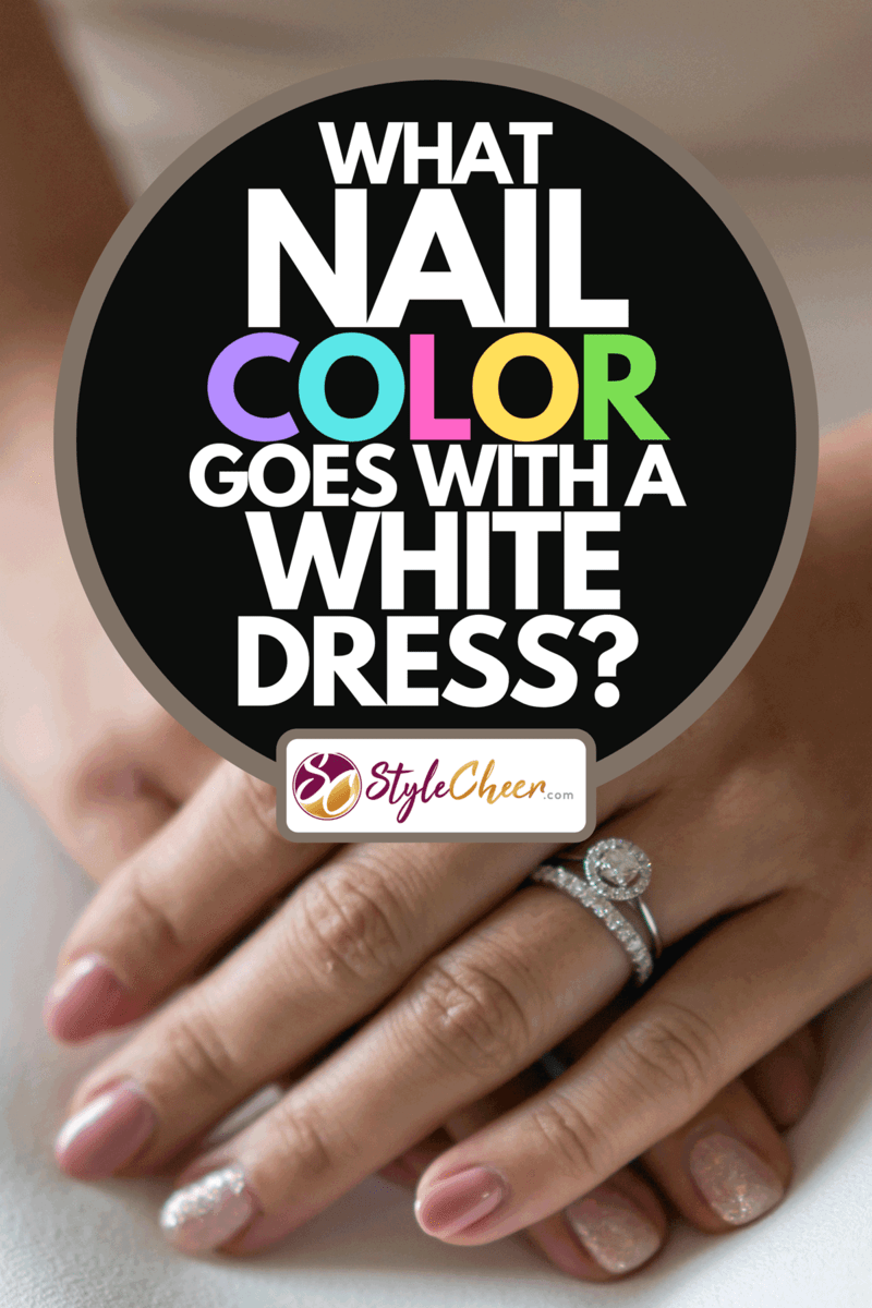 A woman with pink nails dressed in white wedding dress, What Nail Color Goes With A White Dress?