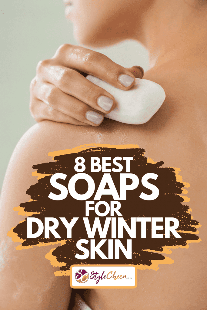Woman holding soap in bathtub, 8 Best Soaps For Dry Winter Skin