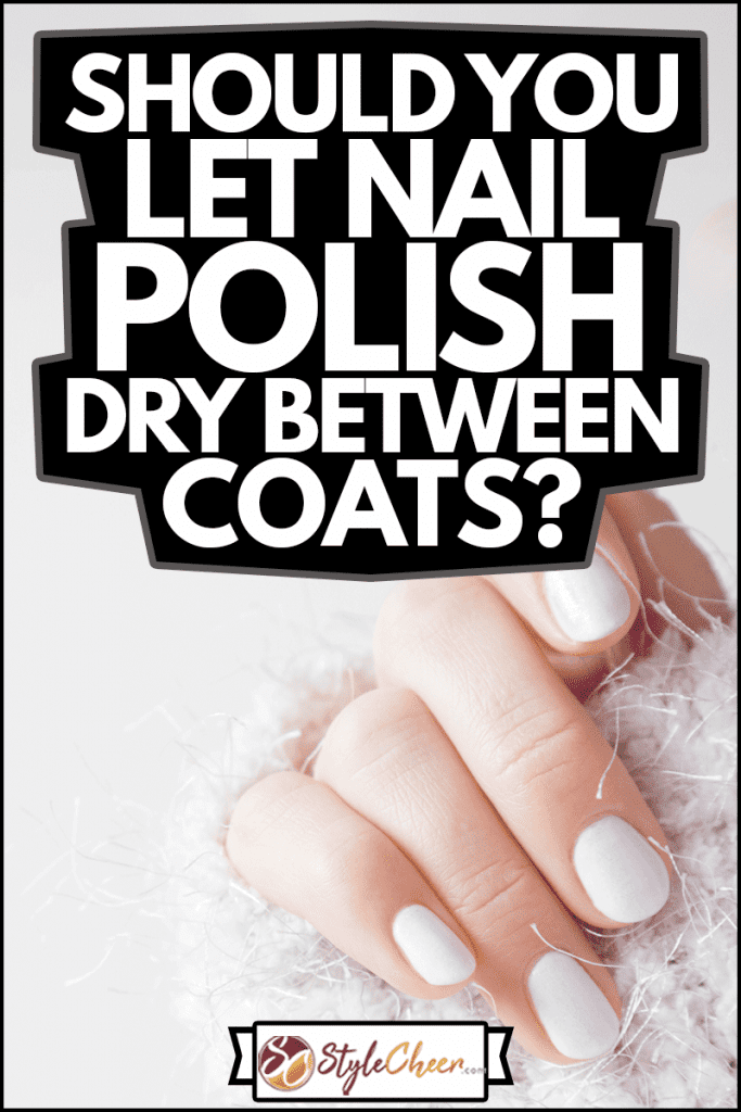 Beautiful manicured woman's hands with white nails on the light gray background, Should you let the nail polish dry between coats?